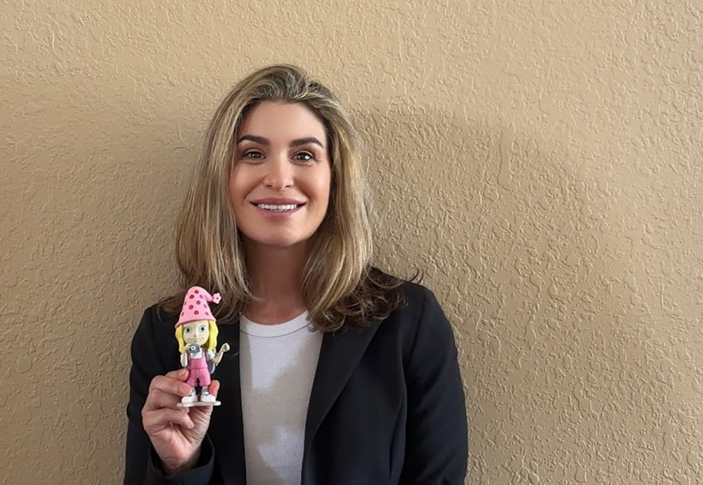 Alexa holding a Gracie Gnome on the Go